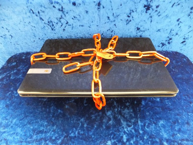 EY Breach Exposed Goldman Sachs Wealth Clients in 11 Quiet Days Laptop computer secured with a padlock representing data protection