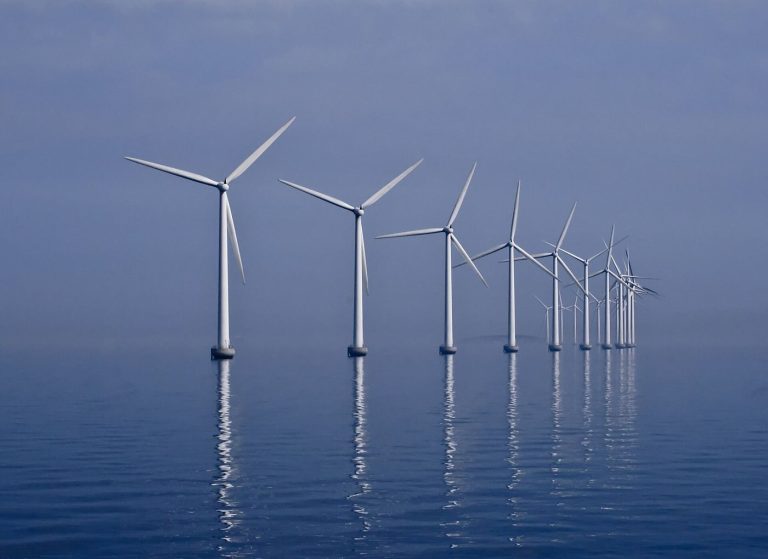 Ports Race to Expand for the Offshore Wind Build-Out Offshore wind turbines at sea