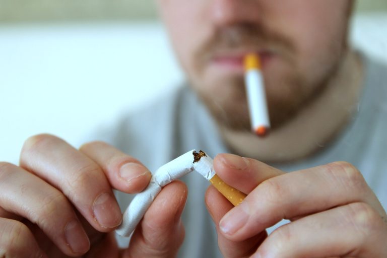 E-Cigarettes After Cessation: A Lung Cancer Evidence Review Evidence review graphic with e-cigarette and research papers
